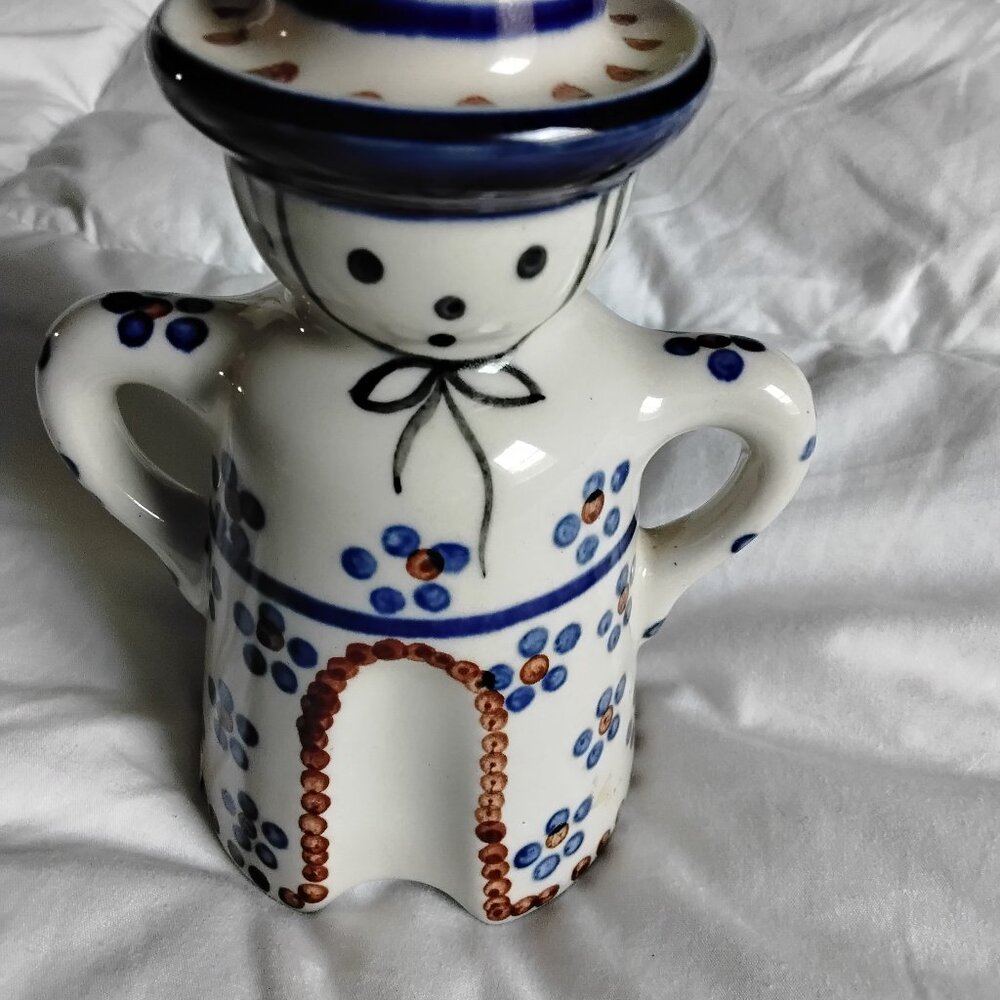 A hand made candle holder by Artisic  Ceramics of Poland.